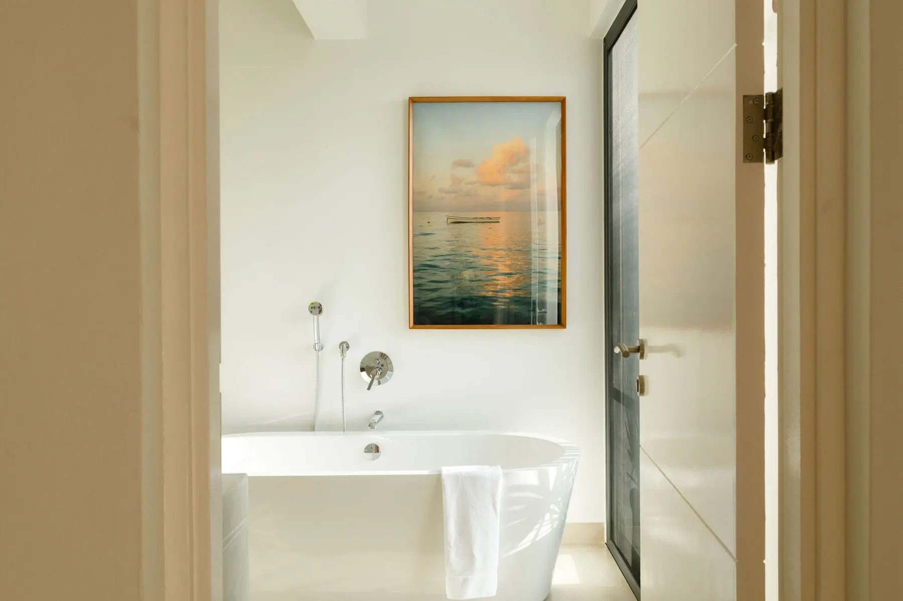 Bathroom with freestanding bathtub